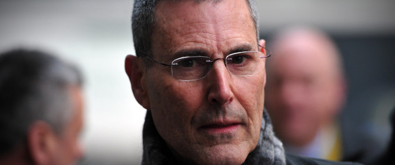 Israeli entertainer Uri Geller arrives to attend a hearing in civil cases taken against Rupert Murdoch's News Group Newspapers over phone hacking at the High Court in central London on February 8, 2013. Geller, was one of 17 people who settled their claims at London's High Court on February 8 brought against Rupert Murdoch's News Group Newspapers, publishers of the now-defunct News of the World tabloid newspaper, over phone hacking. Revelations that the News of the World had hacked celebrities led Murdoch to shut down the tabloid in July 2011. AFP PHOTO / CARL COURT        (Photo credit should read CARL COURT/AFP/Getty Images)
